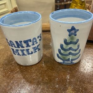 2 Louisville Stoneware Milk Cups. One has a small crack but isn’t leaking.
